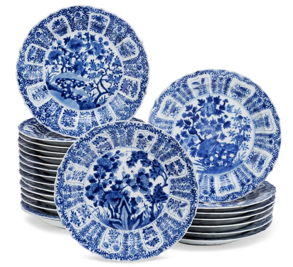 A SET OF TWENTY THREE CHINESE PORCELAIN BLUE AND WHITE MOLDED PLATES KANGXI PERIOD 1662 1722