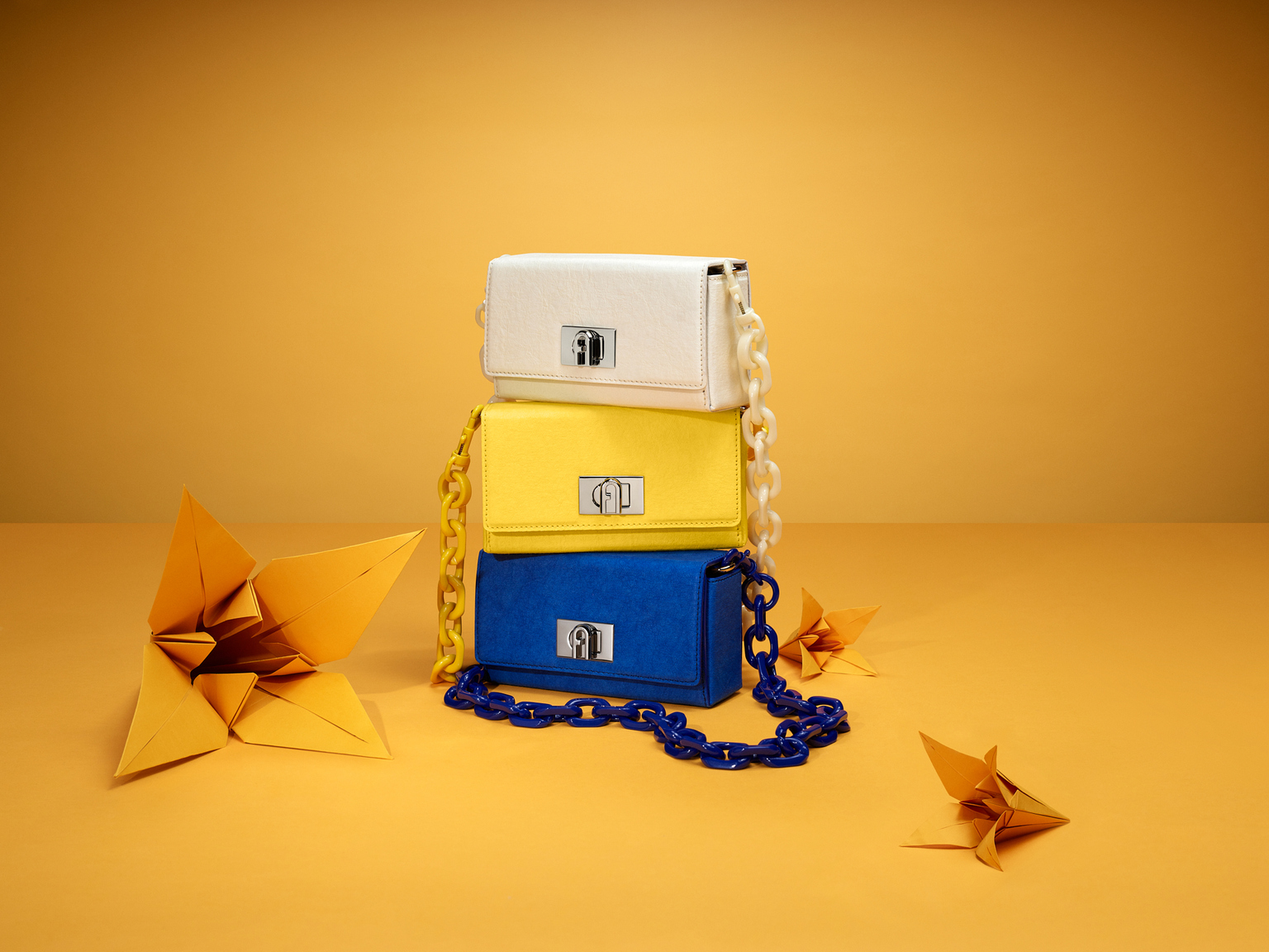 FURLA BLOOM BAG 07 COLOURED GROUP ON YELLOW PLATE BLUE BAG