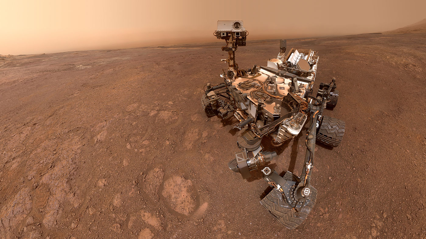 area of mars visited by curiosity shows steep cliffs and blue water its a camera trick 4